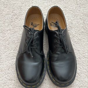 Dr. Martens Black Leather Flats with Yellow Stitching